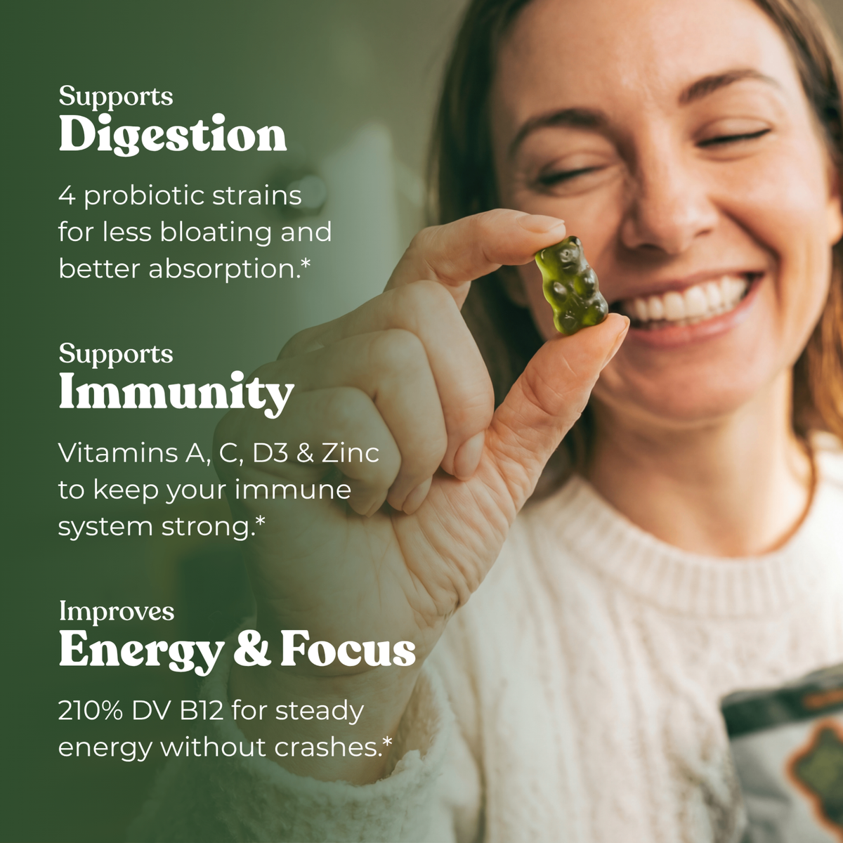 Optimal Human - Superfood Greens Gummies (30 Day Supply) — Smiling brunette woman about to eat a green gummy bear, dark green benefits overlay reads 'Supports Digestion, Supports Immunity, Improves Energy & Focus' with probiotic, vitamin and 210% DV B12 callouts