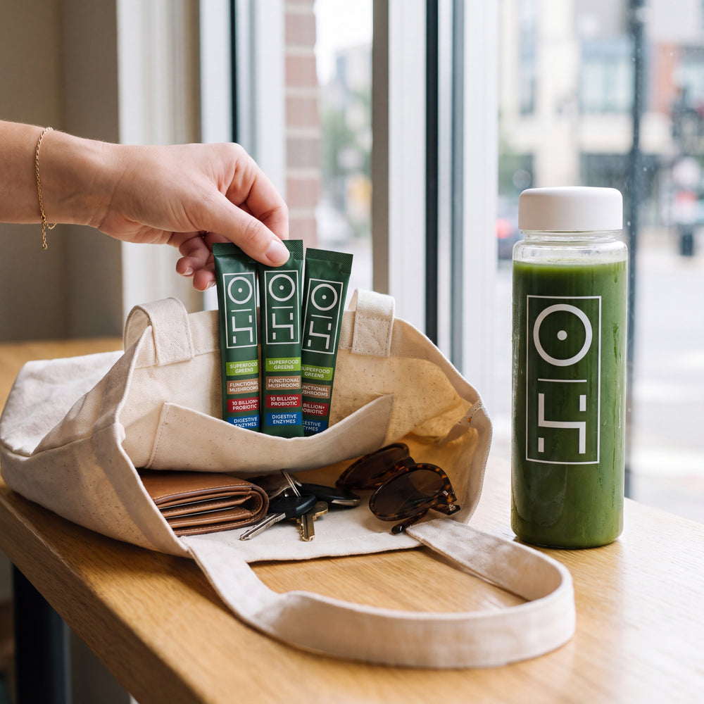 Three Superfood Greens sticks going into a tote bag
