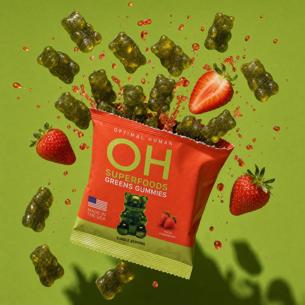 A single-serve pack torn open with green gummies and strawberries bursting out