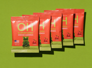 Five single-serve packs of Superfood Greens Gummies
