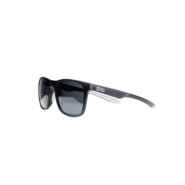 Optimal Human - Optimal Human Sunglasses — Glossy black square-frame Optimal Human sunglasses with smoked gray gradient lenses and white Optimal Human OH boxed logo on the temple, side angle product shot on white